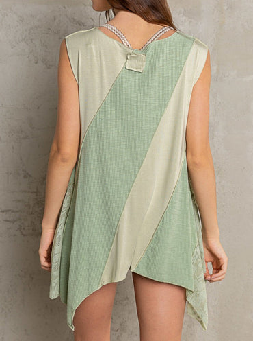 Trestles Clothing Company sage green sleeveless cut and sew top with exposed seams and a shark-bite hem