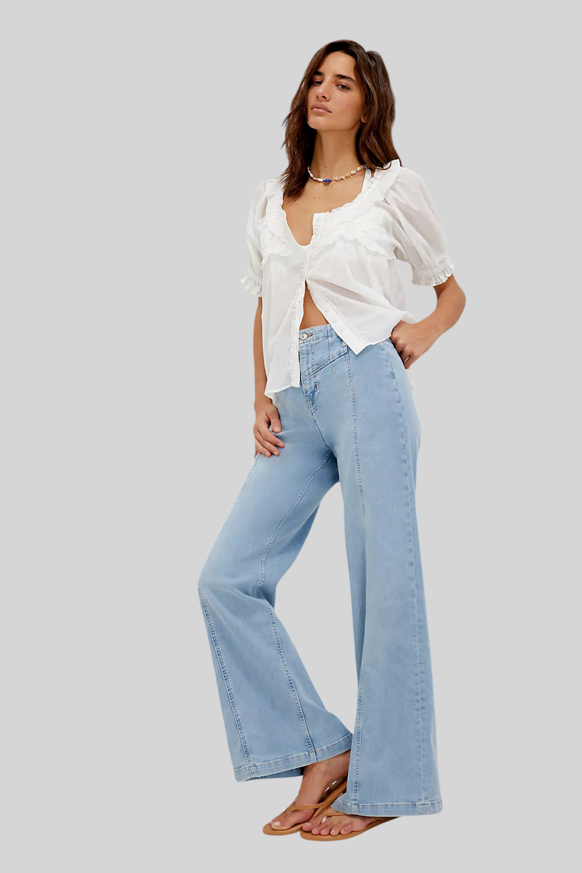 Trestles Clothing Company Libre wide leg jeans in light wash denim with front seam detail worn by a model