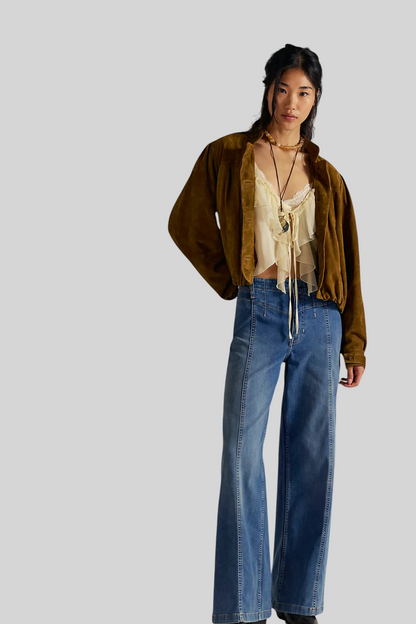 Trestles Clothing Company Libre Wide Leg jeans in blue denim with front seam detail, paired with a brown suede jacket