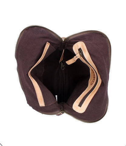 Interior view of the Trestles Clothing Company Aiken Bag showing organic cotton lining and zip pockets