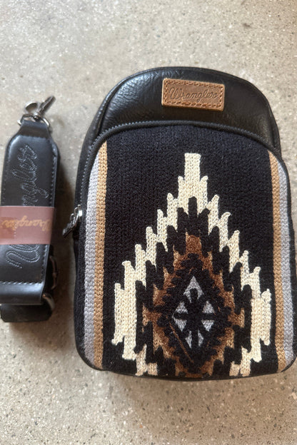 Trestles Clothing Company Aztec sling bag in black canvas and PU leather with a detachable nylon crossbody strap