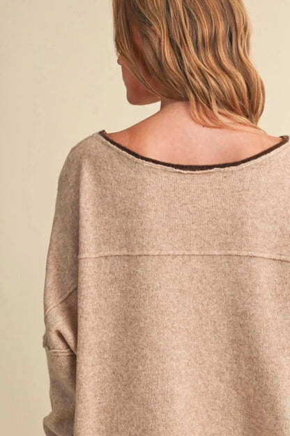 Trestles Clothing Company relaxed beige boatneck sweater with contrast dark brown trim on the neckline