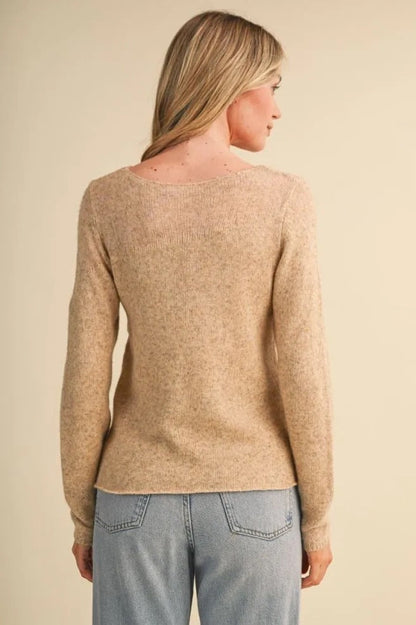 Back view of Trestles Clothing Company beige lightweight knit sweater with boat neckline and long sleeves