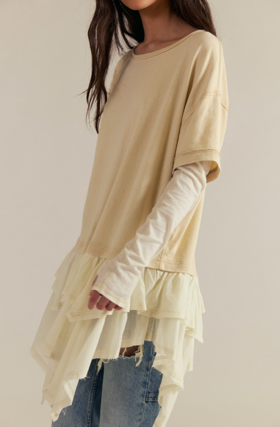 Trestles Clothing Company Tattered Love Tee featuring a beige knit top with layered peplum and long sleeves