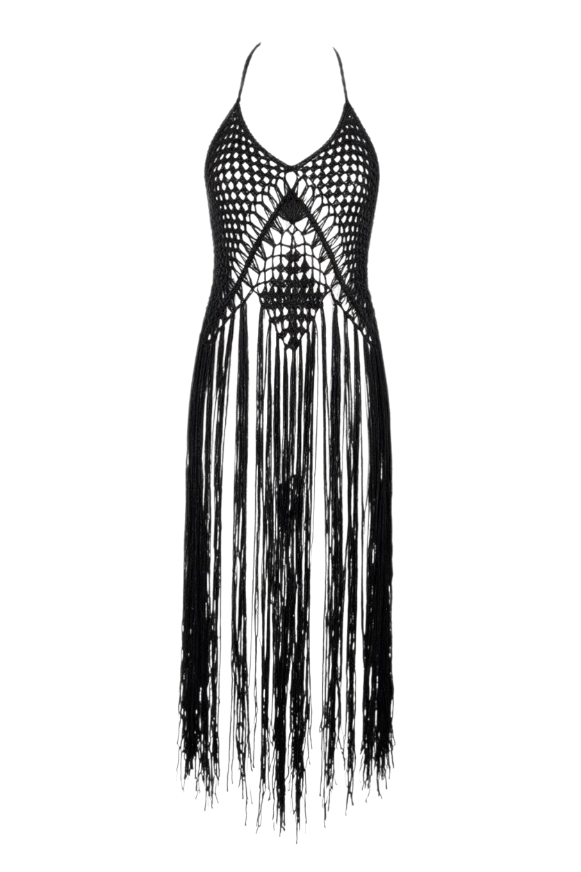 Trestles Clothing Company black crochet halter vest with long fringe worn over olive green pants in a rustic setting