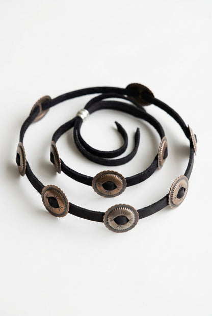 Trestles Clothing Company black suede hat band featuring vintage-style oval metal conchos for a boho Western look.