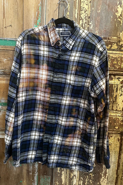 Trestles Clothing Company upcycled blue and white plaid flannel shirt with a bleached vintage finish and button front
