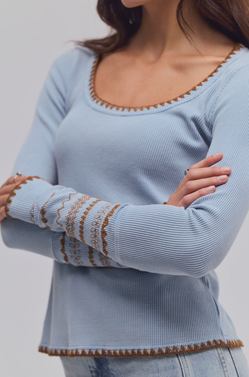 Trestles Clothing Company light blue waffle knit thermal top with brown contrast stitching and long sleeves