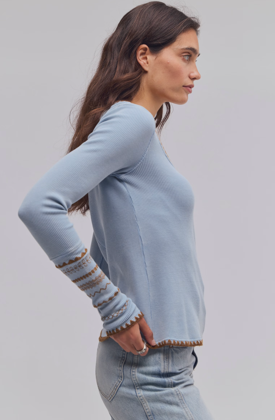 Trestles Clothing Company light blue waffle knit thermal top with contrast stitching and long sleeves on a model
