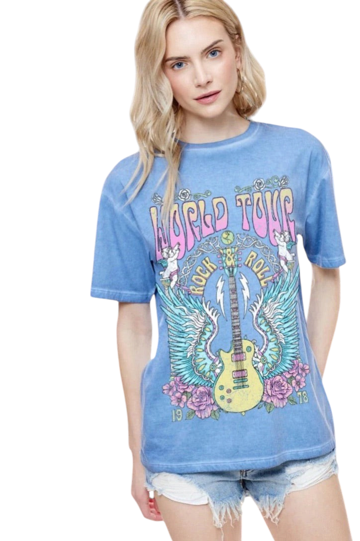 Trestles Clothing Company blue cotton graphic tee with vintage World Tour 1978 rock and roll print on a model