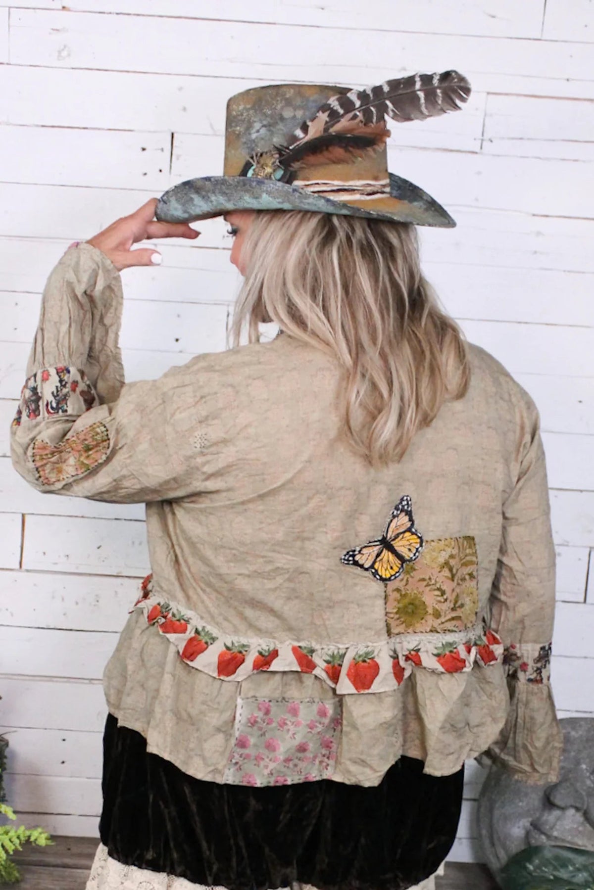 Trestles Clothing Company boho cotton blouse in moss green with strawberry patches, butterfly embroidery, and ruffles