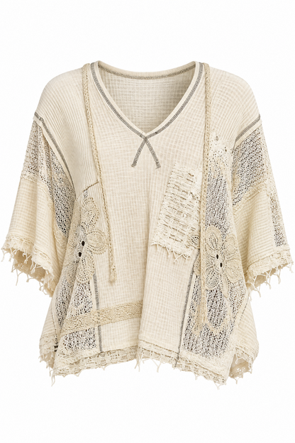 Trestles Clothing Company cream boho patchwork V-neck hoodie with lace panels, crochet florals, and raw edge hem.