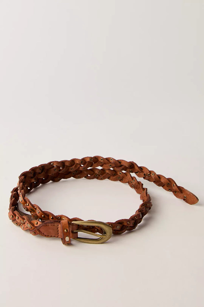 Trestles Clothing Company slim brown braided leather belt featuring metal studs and an antique brass buckle