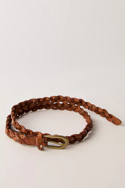 Trestles Clothing Company slim brown braided leather belt featuring metal studs and an antique brass buckle