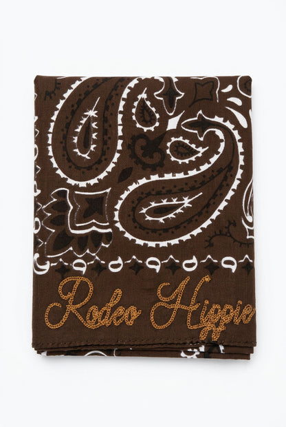 Trestles Clothing Company brown paisley bandana with Rodeo Hippie chainstitched embroidery and stonewashed finish.