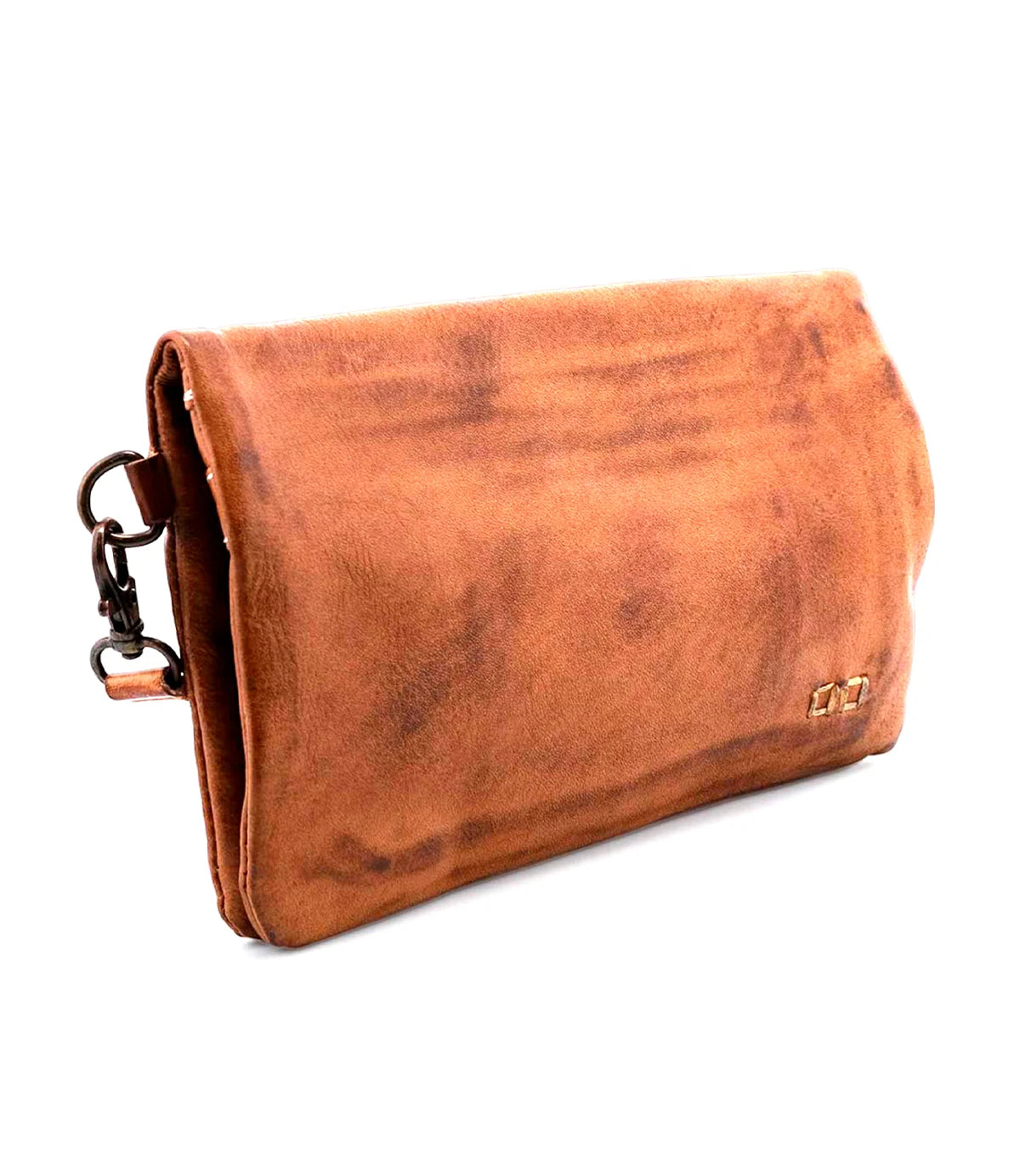 Trestles Clothing Company Cadence crossbody bag in distressed brown vegetable-tanned leather with a magnetic closure.
