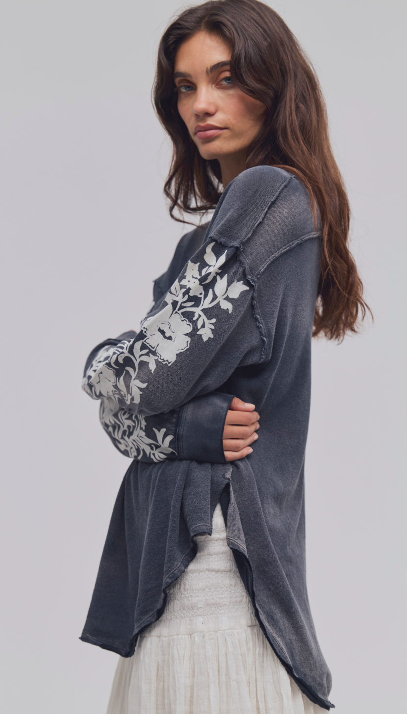 Trestles Clothing Company Flora long sleeve tee in charcoal grey with white floral sleeve print and dropped shoulders