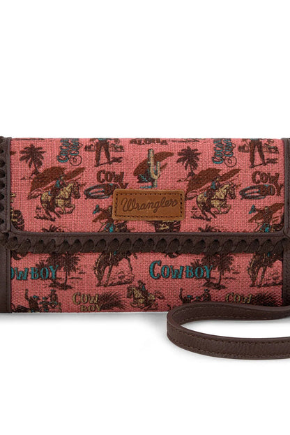 Trestles Clothing Company retro cowboy print crossbody wallet in pink canvas and brown PU leather with whipstitch trim