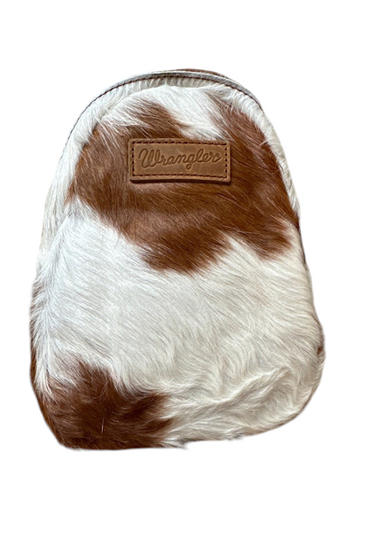 Trestles Clothing Company Western sling bag in brown and white genuine hair-on cowhide with a Wrangler leather patch
