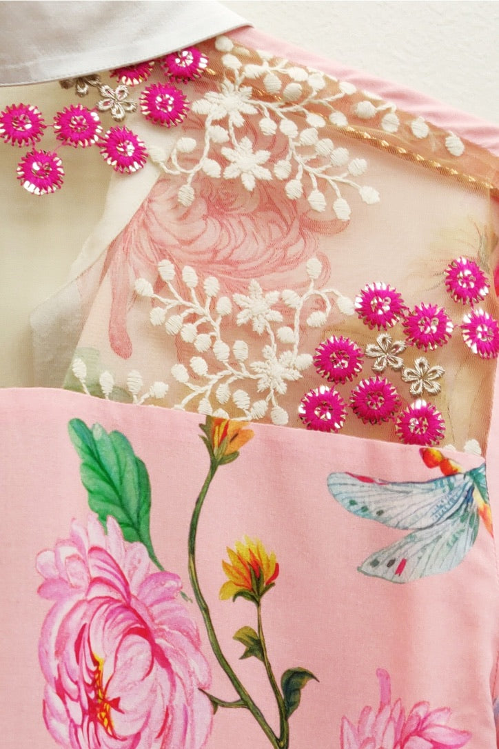 Trestles Clothing Company Legend of the Crane blouse featuring pink floral print, tulle, and bright pink sequins.