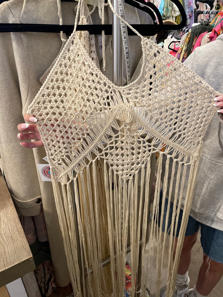 Trestles Clothing Company cream crochet halter top with intricate macrame weave and long fringe for a boho festival look