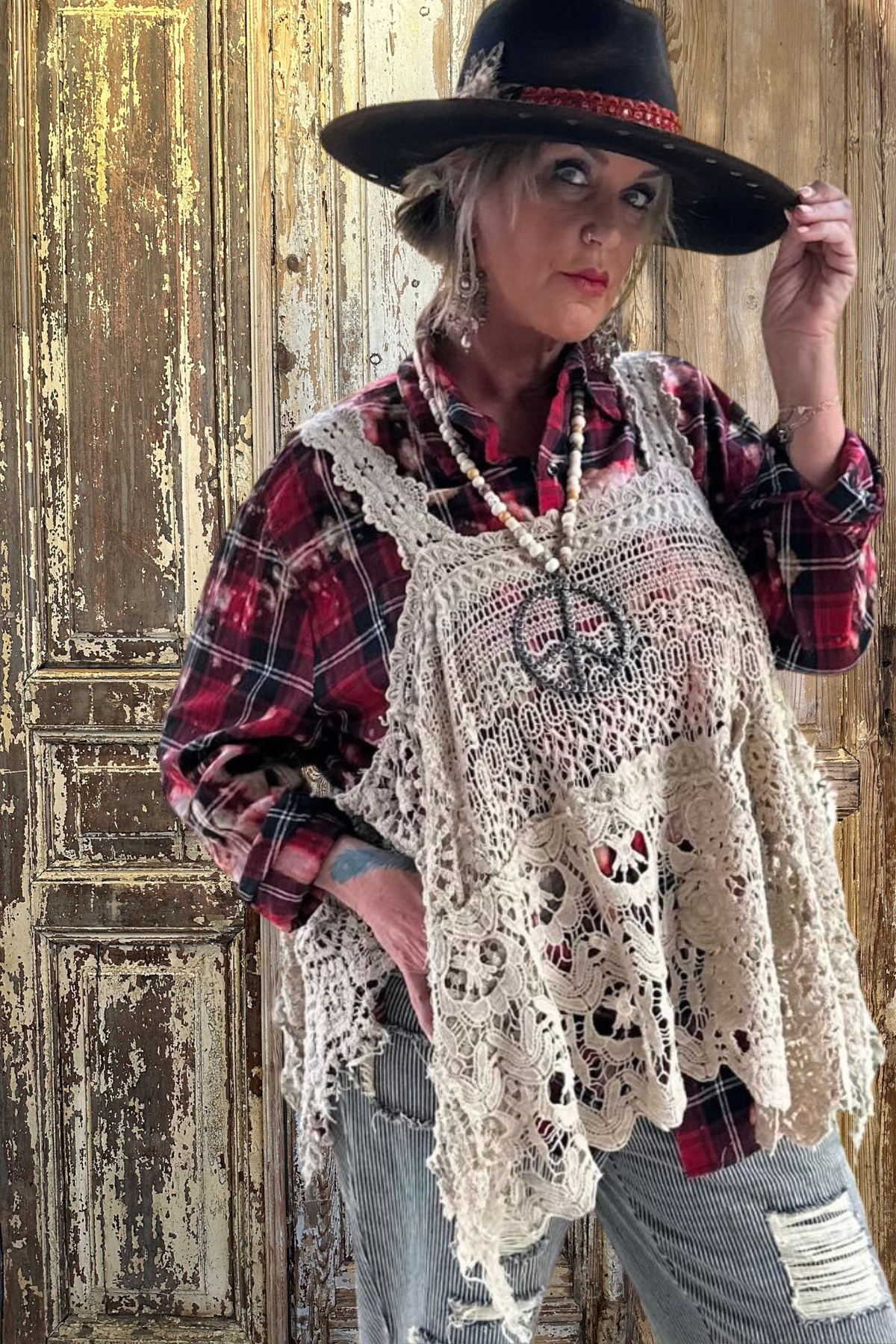 Trestles Clothing Company Forever Timeless Tank in cream crochet lace worn over a red plaid shirt with a fedora hat