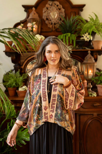 Trestles Clothing Company cropped kimono featuring Victorian archival floral print and Courage Dear Heart trim text.