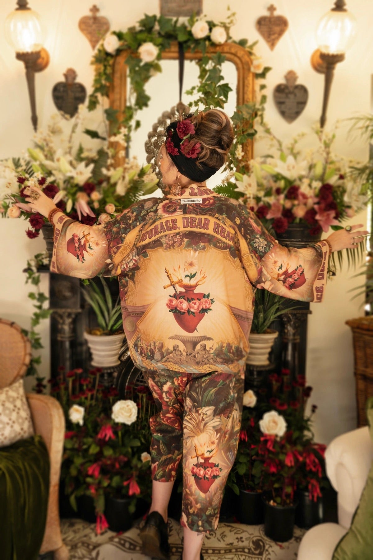 Trestles Clothing Company cropped kimono featuring Victorian archival artwork, sacred heart motifs, and floral prints.