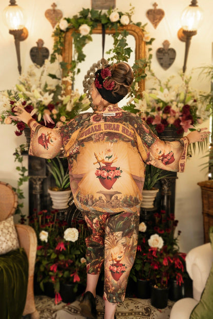 Trestles Clothing Company cropped kimono featuring Victorian archival artwork, sacred heart motifs, and floral prints.