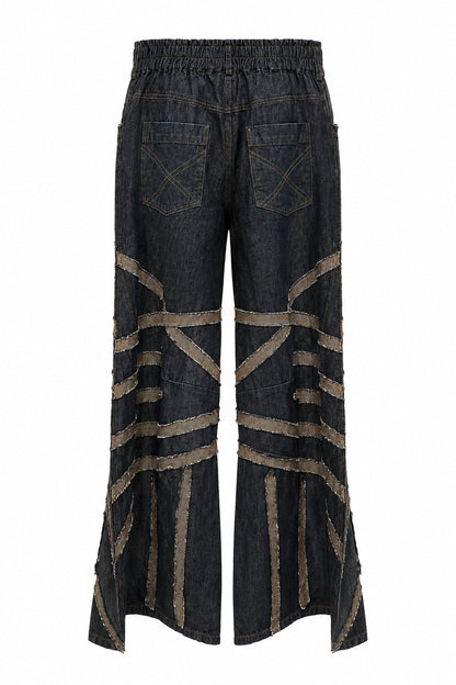 Trestles Clothing Company dark denim wide leg jeans with distressed fabric patches and an elastic back waistband