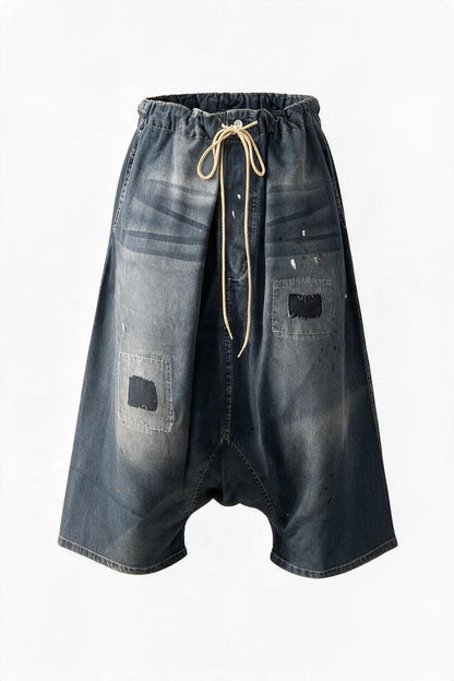 Trestles Clothing Company Earthsong harem pants in distressed blue cotton with paint splatters and a drawstring waist