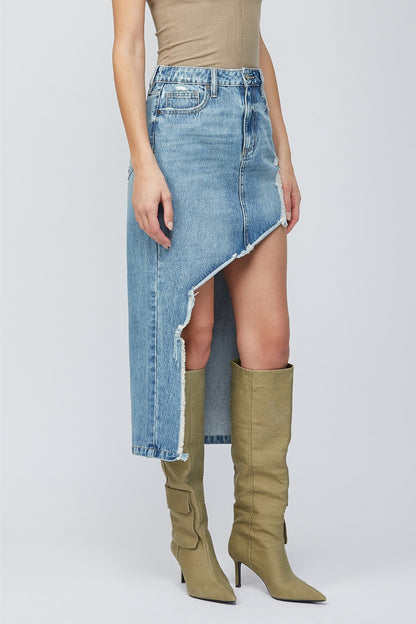 Trestles Clothing Company distressed denim maxi skirt with a high-low raw-cut hem worn with olive green knee-high boots