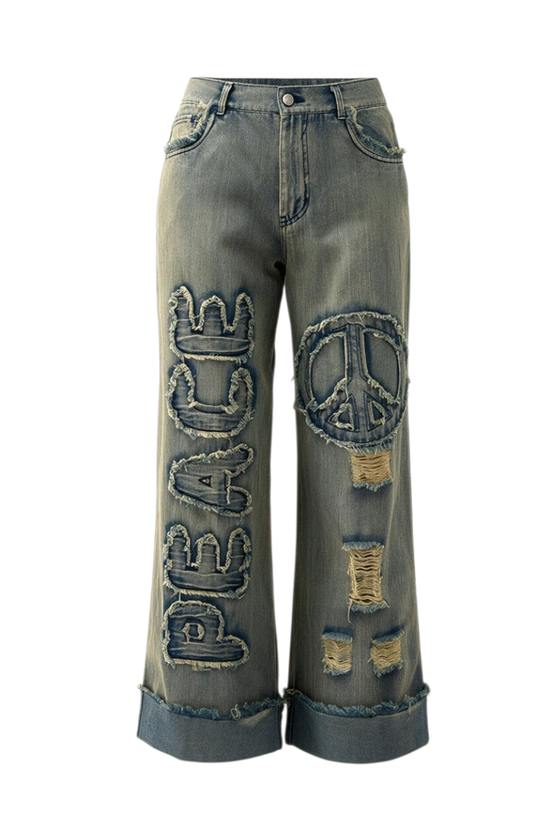 Trestles Clothing Company wide-leg distressed denim jeans with a large peace sign patch and PEACE applique text