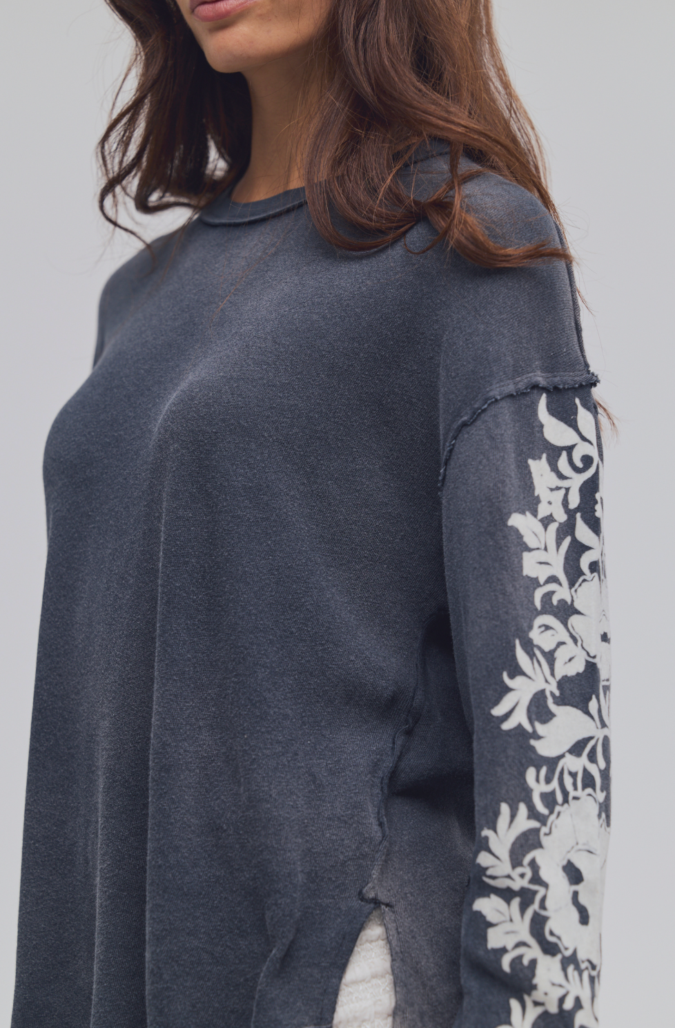 Trestles Clothing Company Flora long sleeve tee in charcoal grey cotton with white floral sleeve print and raw seams