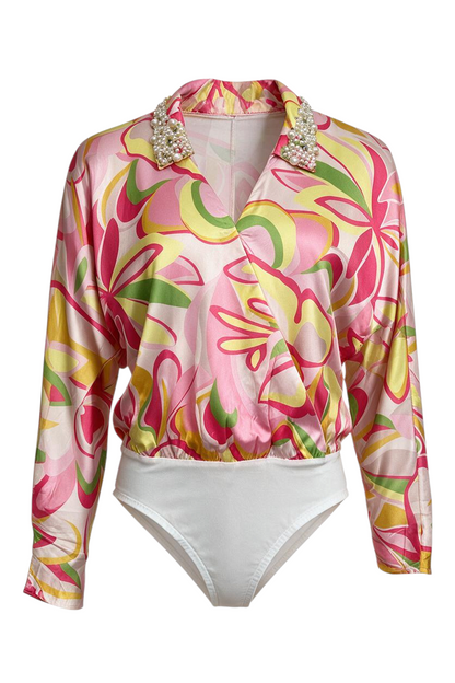 Trestles Clothing Company disco bodysuit with long sleeves, pink and yellow floral print, and pearl-embellished collar.