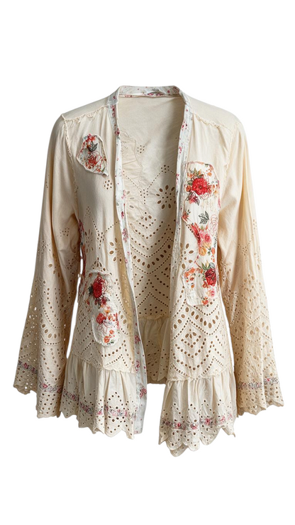 Trestles Clothing Company short cream cotton kimono with floral patchwork, eyelet lace details, and a ruffled hem.