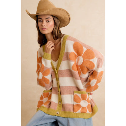 Trestles Clothing Company oversized knit cardigan with retro floral print, striped pattern, and front pockets