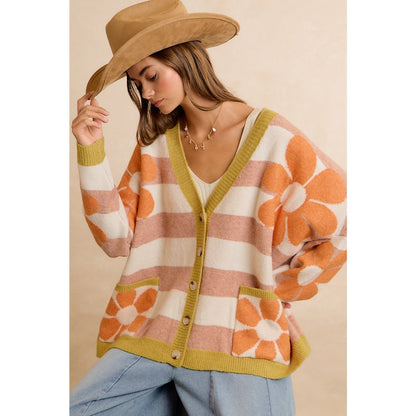 Trestles Clothing Company oversized knit cardigan with retro floral print, horizontal stripes, and front pockets.