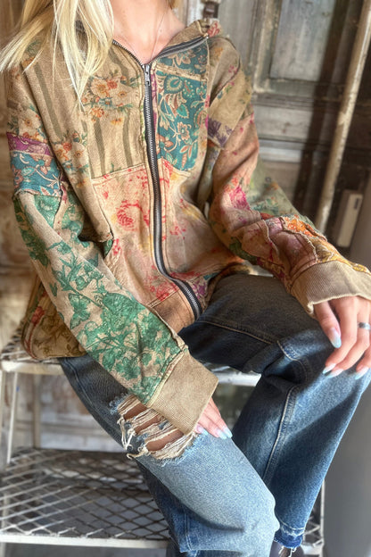 Trestles Clothing Company floral patchwork zip-up hoodie in warm autumn colors with kangaroo pockets and ribbed cuffs