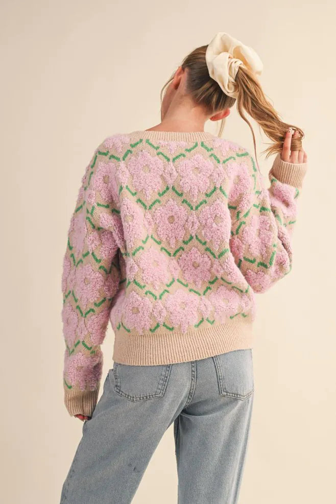 Trestles Clothing Company retro fuzzy floral knit sweater with pink flowers and green stems on a beige background
