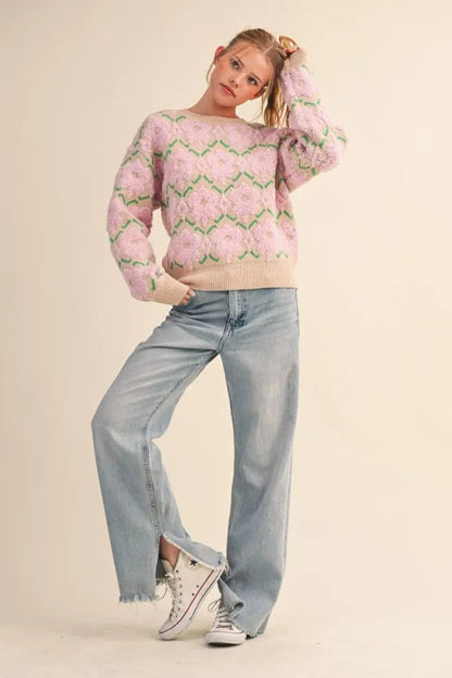 Trestles Clothing Company fuzzy floral knit sweater in pink and beige with a relaxed fit and drop shoulders.