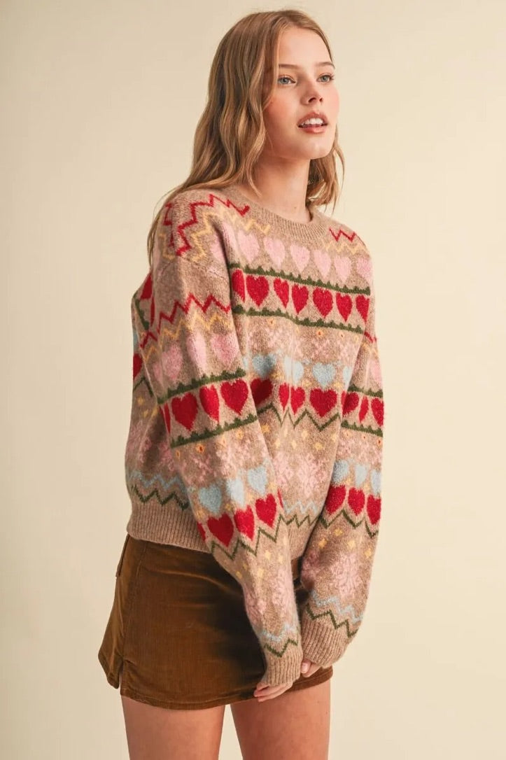Trestles Clothing Company Gingerbread Hearts Sweater with a cozy knit, geometric heart pattern, and relaxed fit.