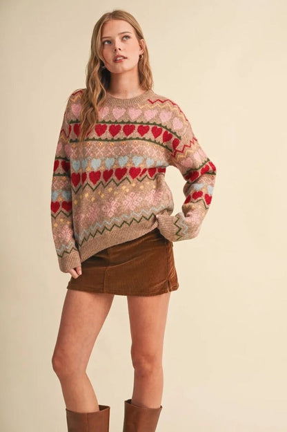 Trestles Clothing Company Gingerbread Hearts Sweater with a geometric heart pattern, round neck, and relaxed fit.