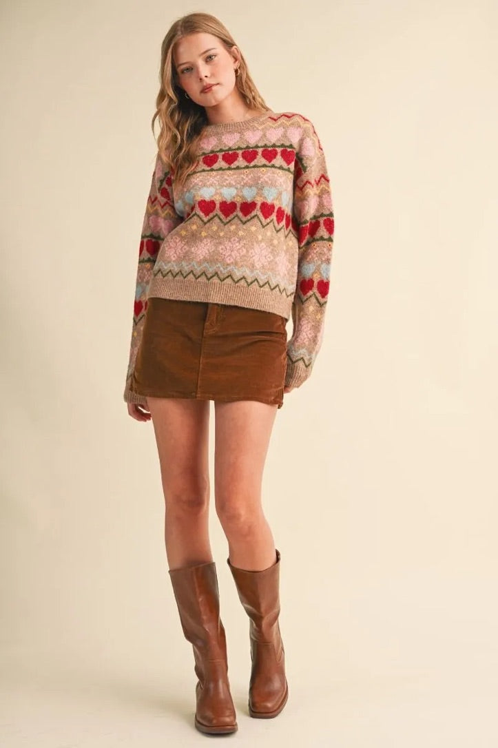 Trestles Clothing Company Gingerbread Hearts Sweater with geometric heart pattern, round neck, and relaxed knit fit.