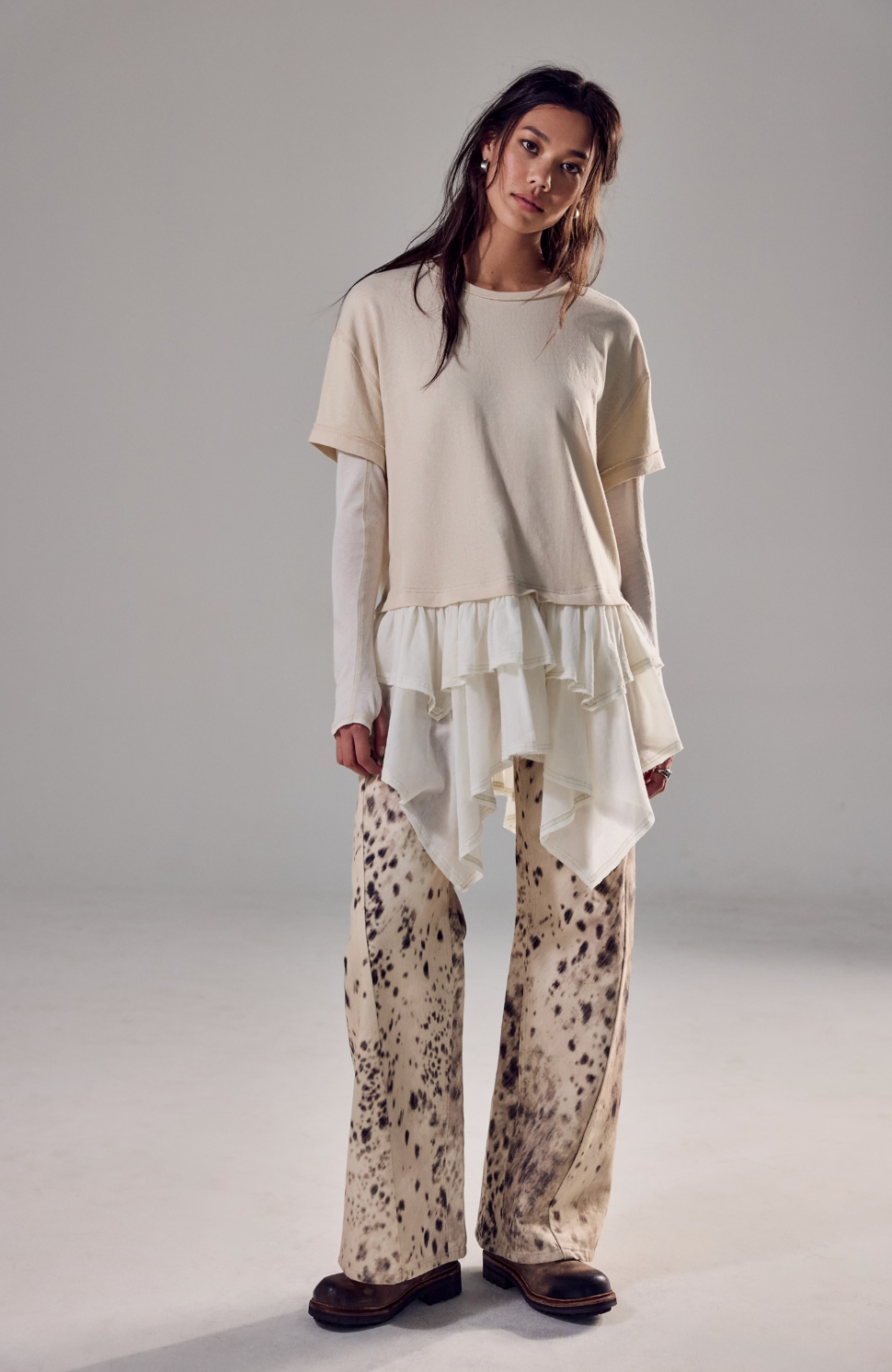 Trestles Clothing Company Tattered Love Tee featuring a beige knit top with double-layer peplum and short sleeves.