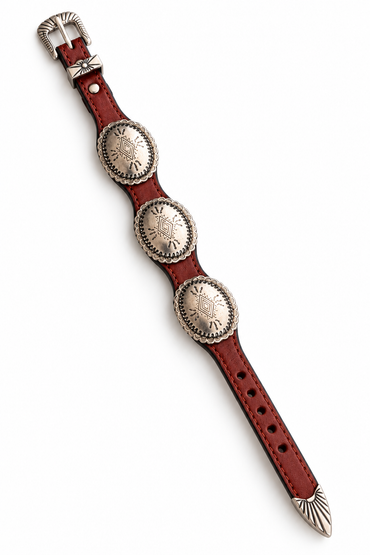 Trestles Clothing Company brown leather bracelet with three silver Western conchos and an adjustable buckle closure.