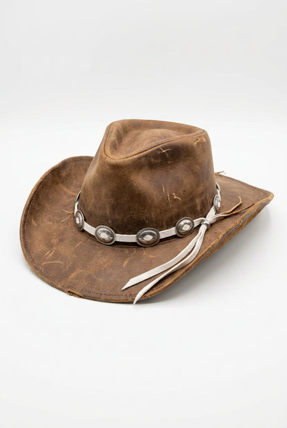 Trestles Clothing Company brown suede cowboy hat featuring an adjustable silver oval concho hat band