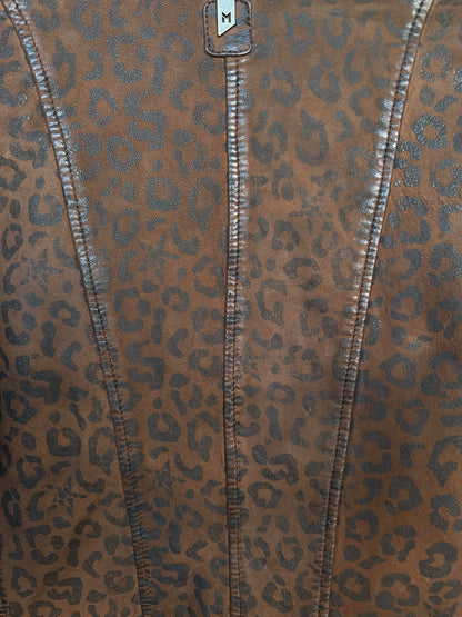 Trestles Clothing Company Nyxa leather jacket featuring a brown and black leopard print pattern and stitched seams.