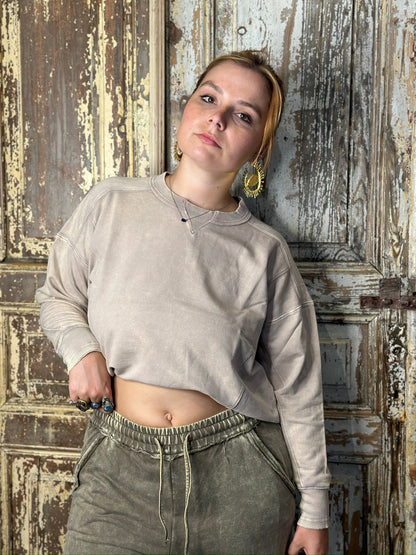 Trestles Clothing Company mineral washed oversized sweatshirt with a high low hem in a soft beige cotton fabric