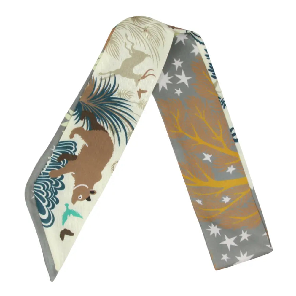 Trestles Clothing Company Mythical Animals Twilly scarf featuring a cream, brown, and grey forest-themed print.